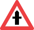A11: Farligt vejkryds - gul advarselstrekant med kryds-symbol